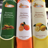 Confezioni di torrone siciliano ricoperto al pistacchio, arancia e limone